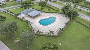 144 Mansfield D, Unit 144 Boca Raton, FL 33434 - Photo 26 of 37 an aerial view of a house