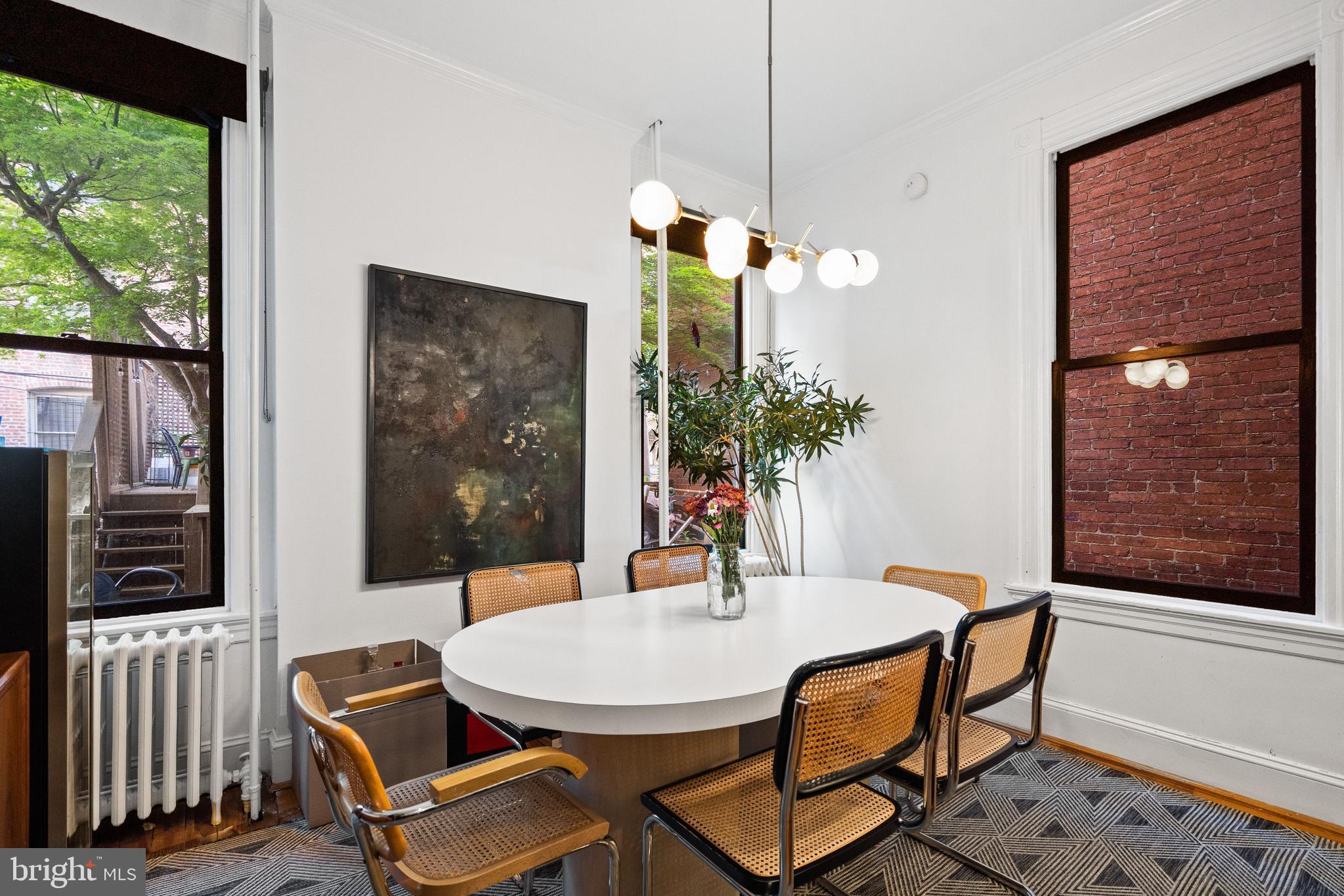 2026 15th Street Northwest Washington, DC 20009 - Photo 15 of 47 a dining room with furniture and window