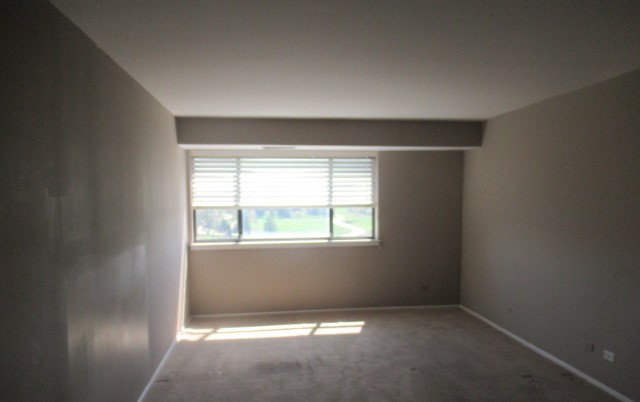 701 Forum Square, Unit 607 Glenview, IL 60025 - Photo 12 of 13 an empty room with a window