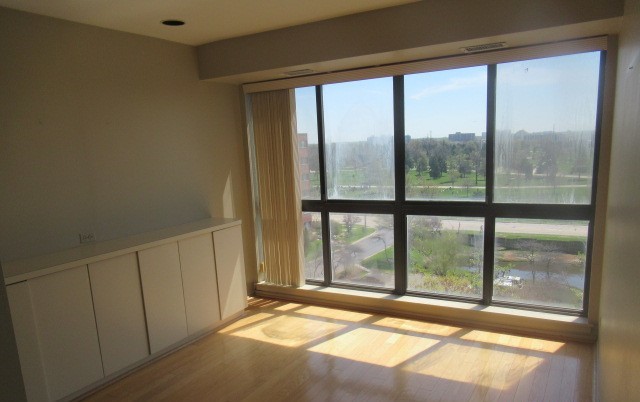 701 Forum Square, Unit 607 Glenview, IL 60025 - Photo 5 of 13 a view of an empty room and window