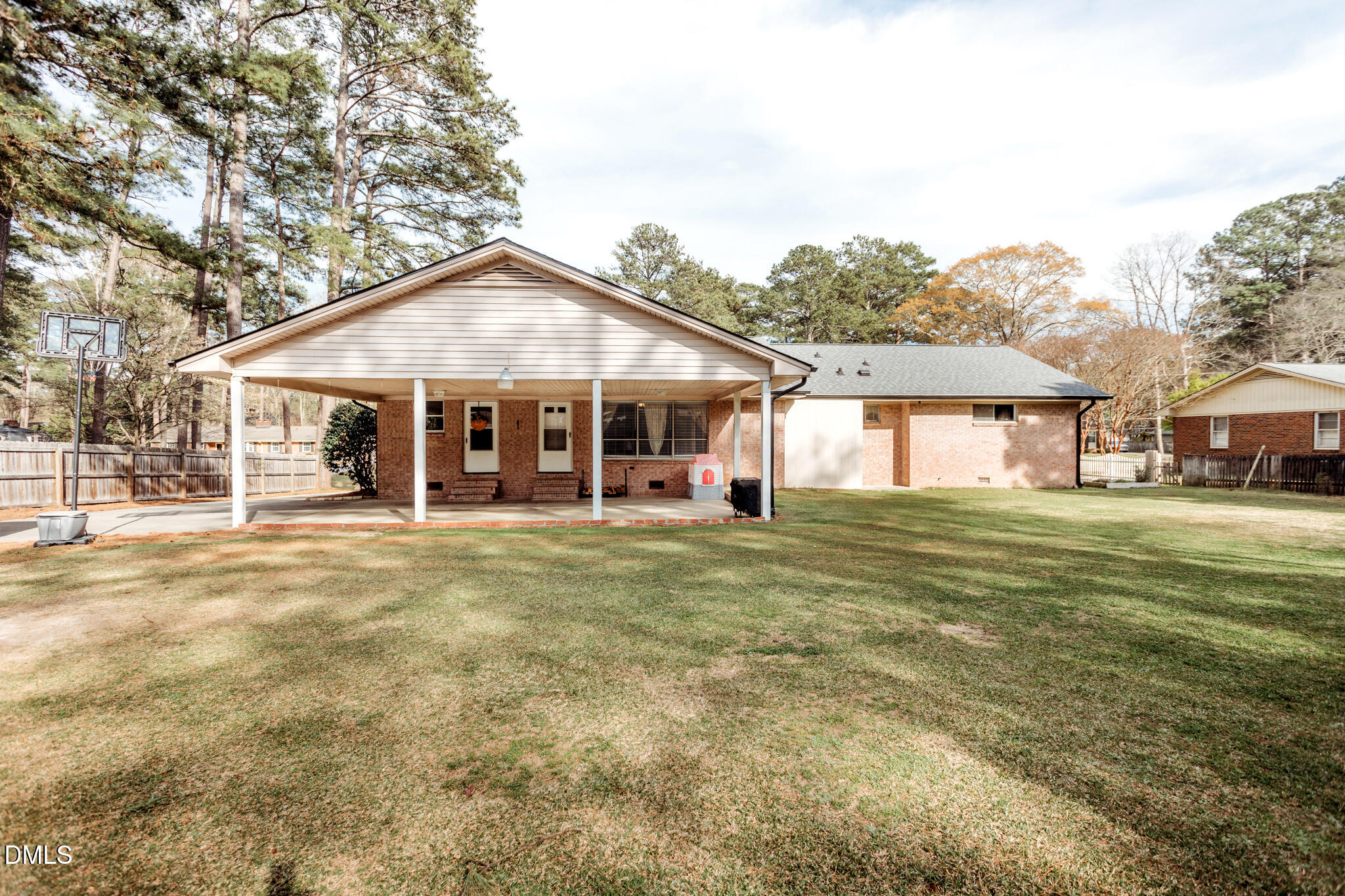 1109 Robin Hill Road Northwest Wilson, NC 27896 - Photo 17 of 19 a front view of a house with a garden