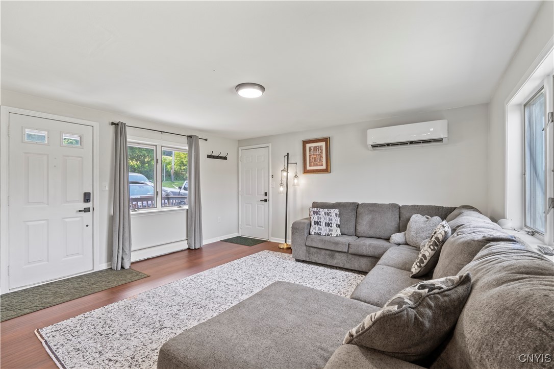 3229 Gardner Road Onondaga, NY 13215 - Photo 7 of 47 Family room with view of garage entrance