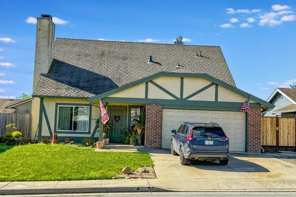 a car parked in front of a house
