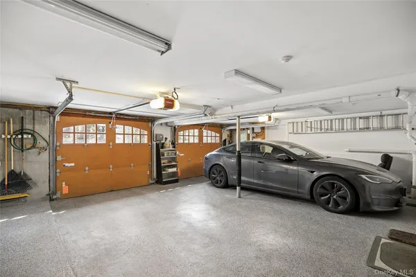 a view of a garage with car parked