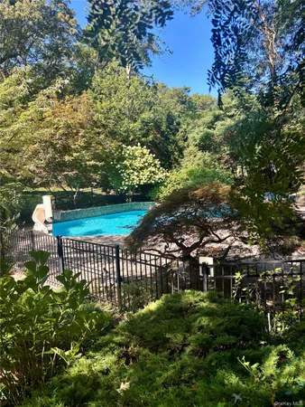 a view of a wrought iron fence