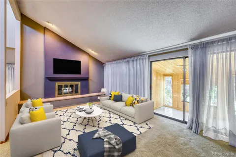 a bedroom with a large bed and a night stand