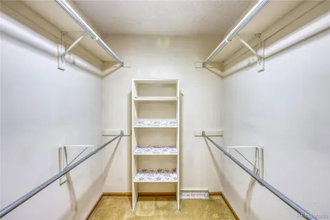 a bedroom with a bed and sliding door