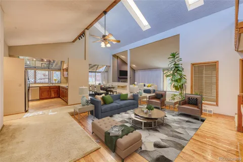 a kitchen with stainless steel appliances granite countertop a sink and cabinets