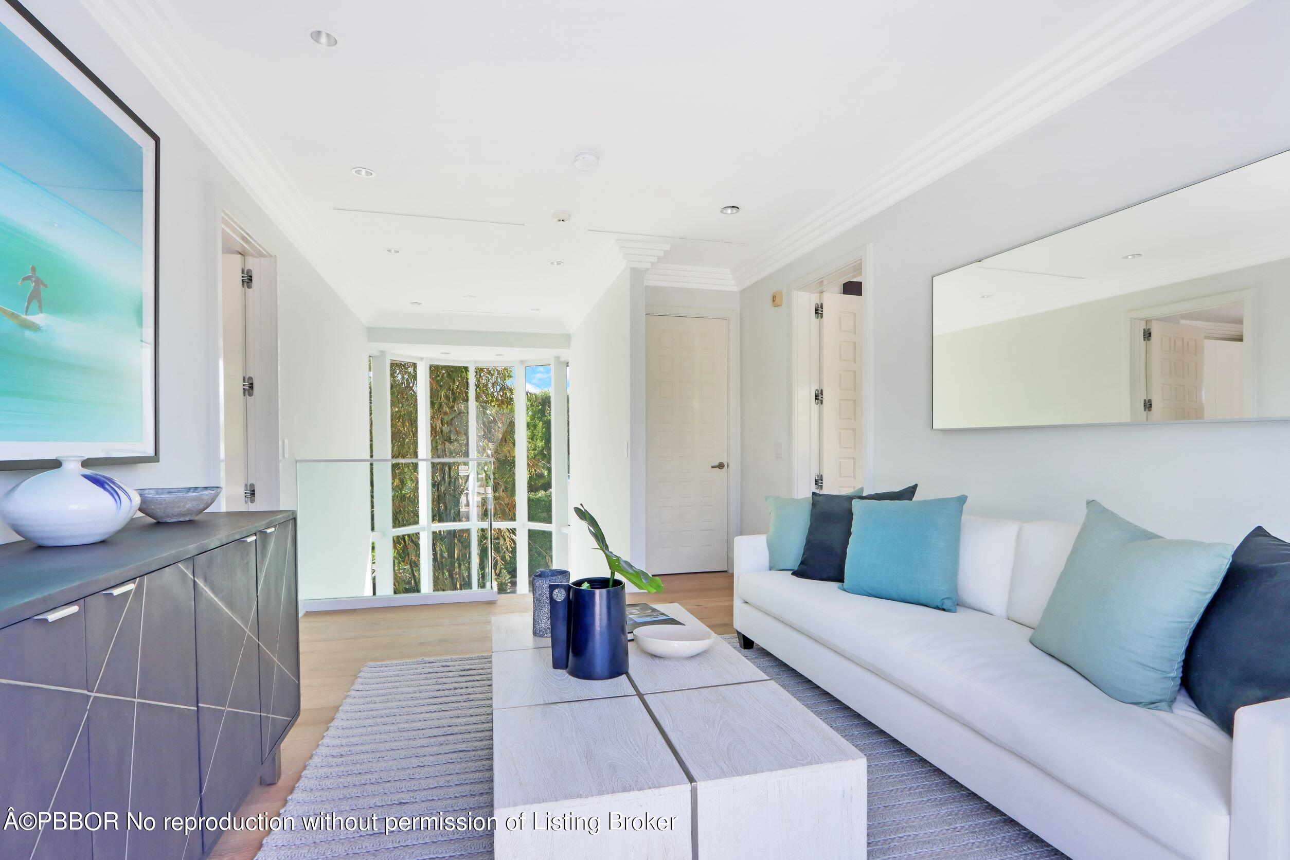 215 Indian Road Palm Beach, FL 33480 - Photo 13 of 32 a living room with furniture and a large window