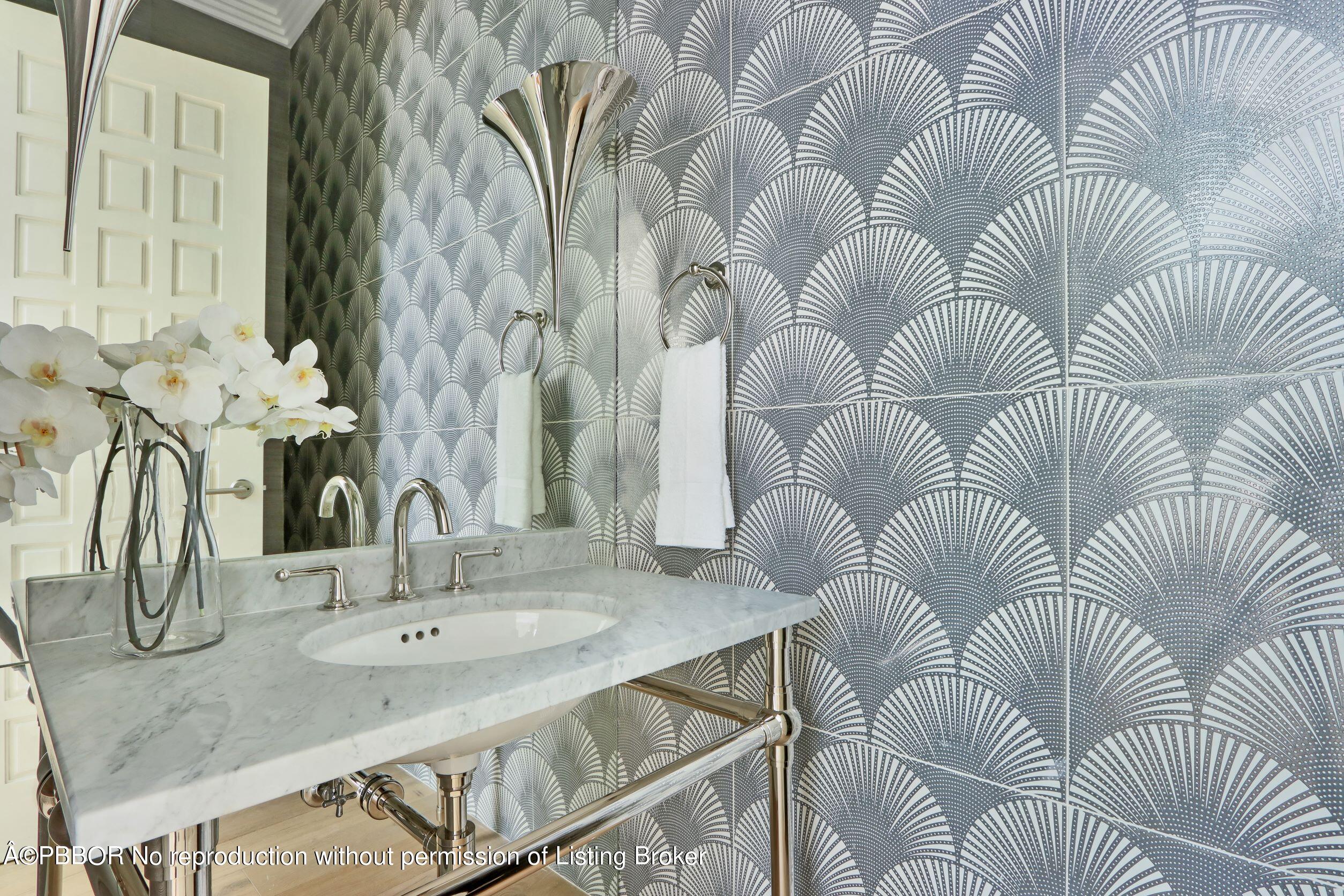 215 Indian Road Palm Beach, FL 33480 - Photo 27 of 32 a bathroom with a sink and mirror