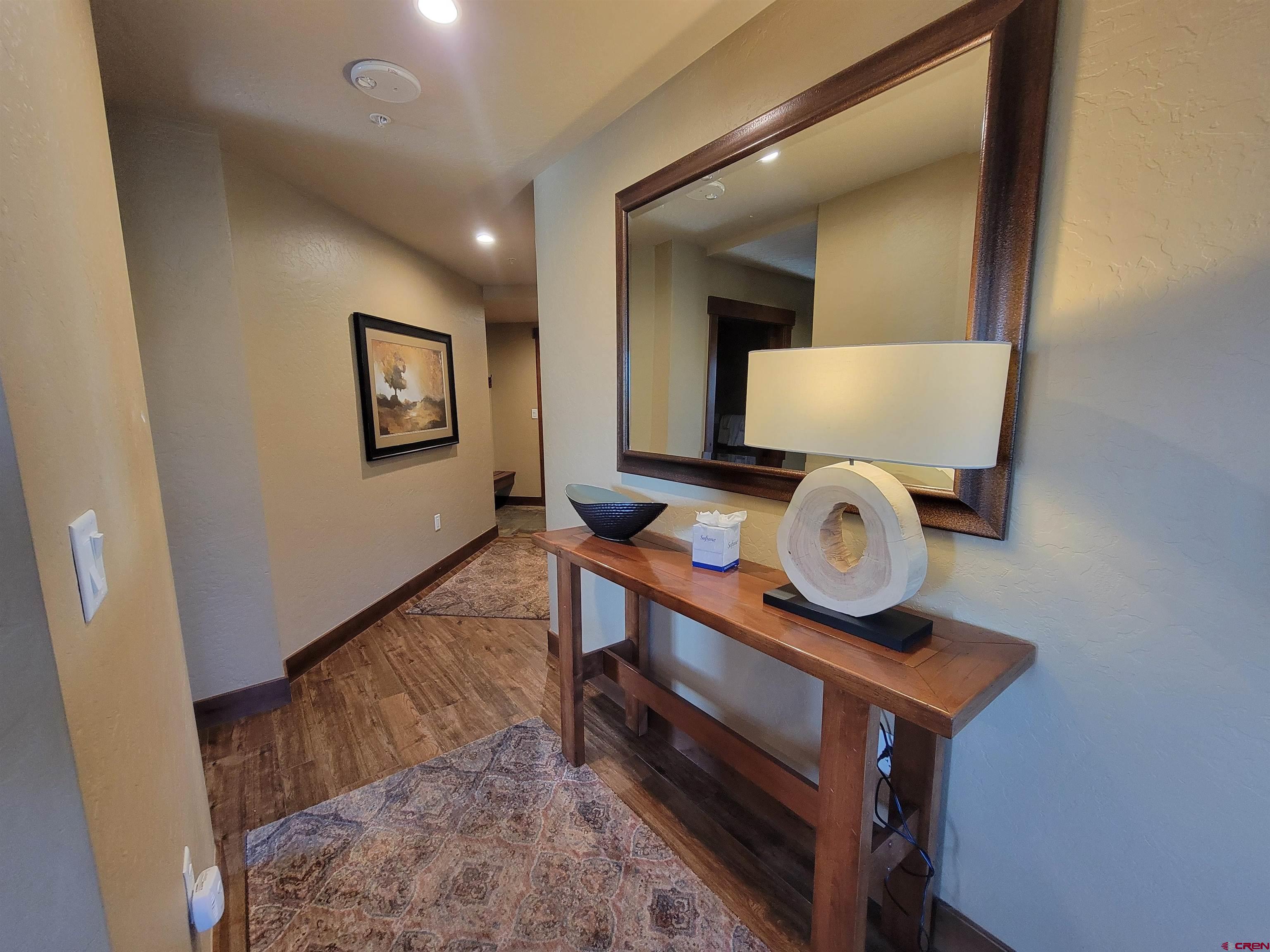 24 Sheol Street, Unit 101D Durango, CO 81301 - Photo 14 of 32 a view of dining room and wooden floor