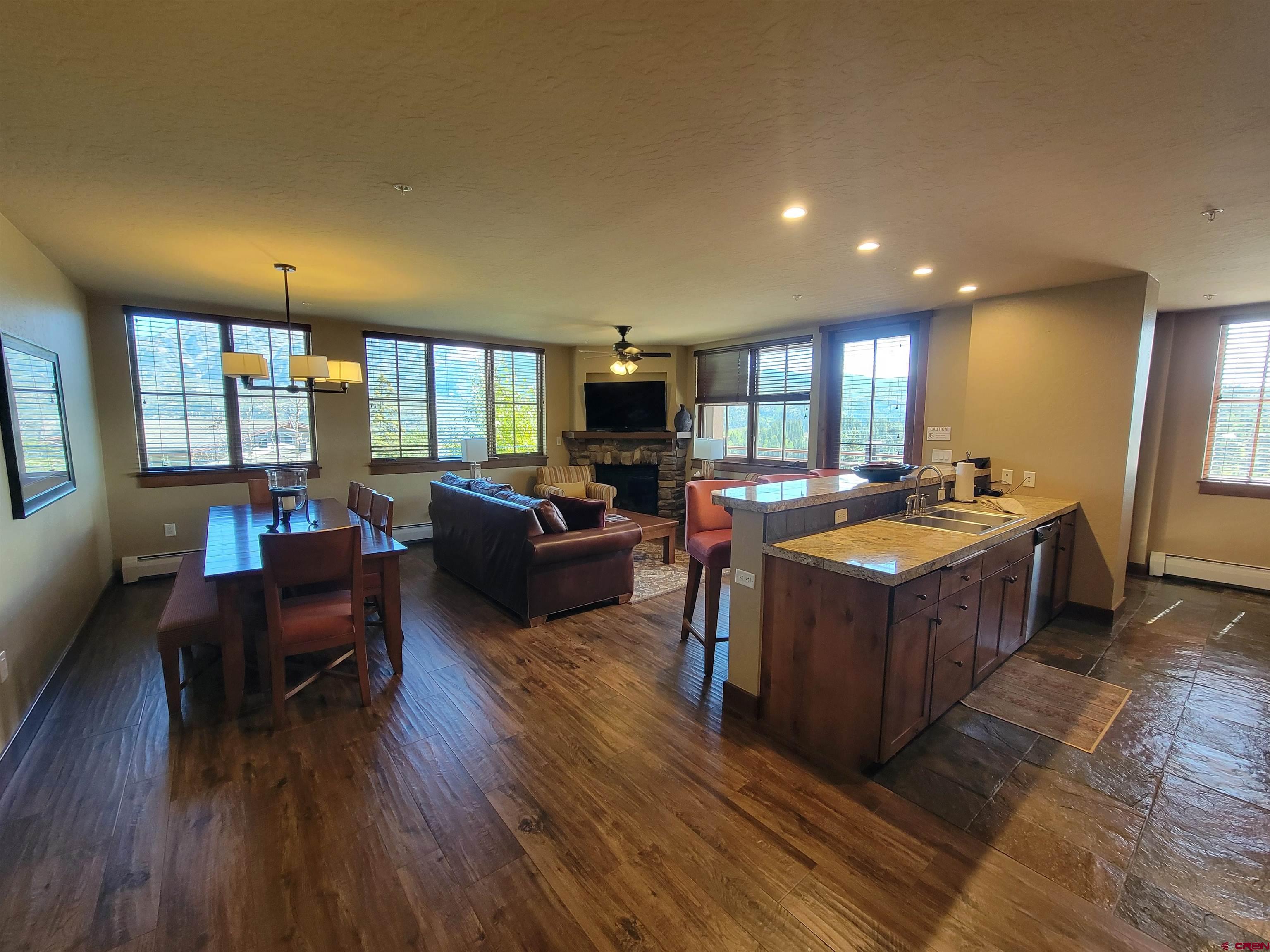 24 Sheol Street, Unit 101D Durango, CO 81301 - Photo 2 of 32 a living room with furniture and a wooden floor