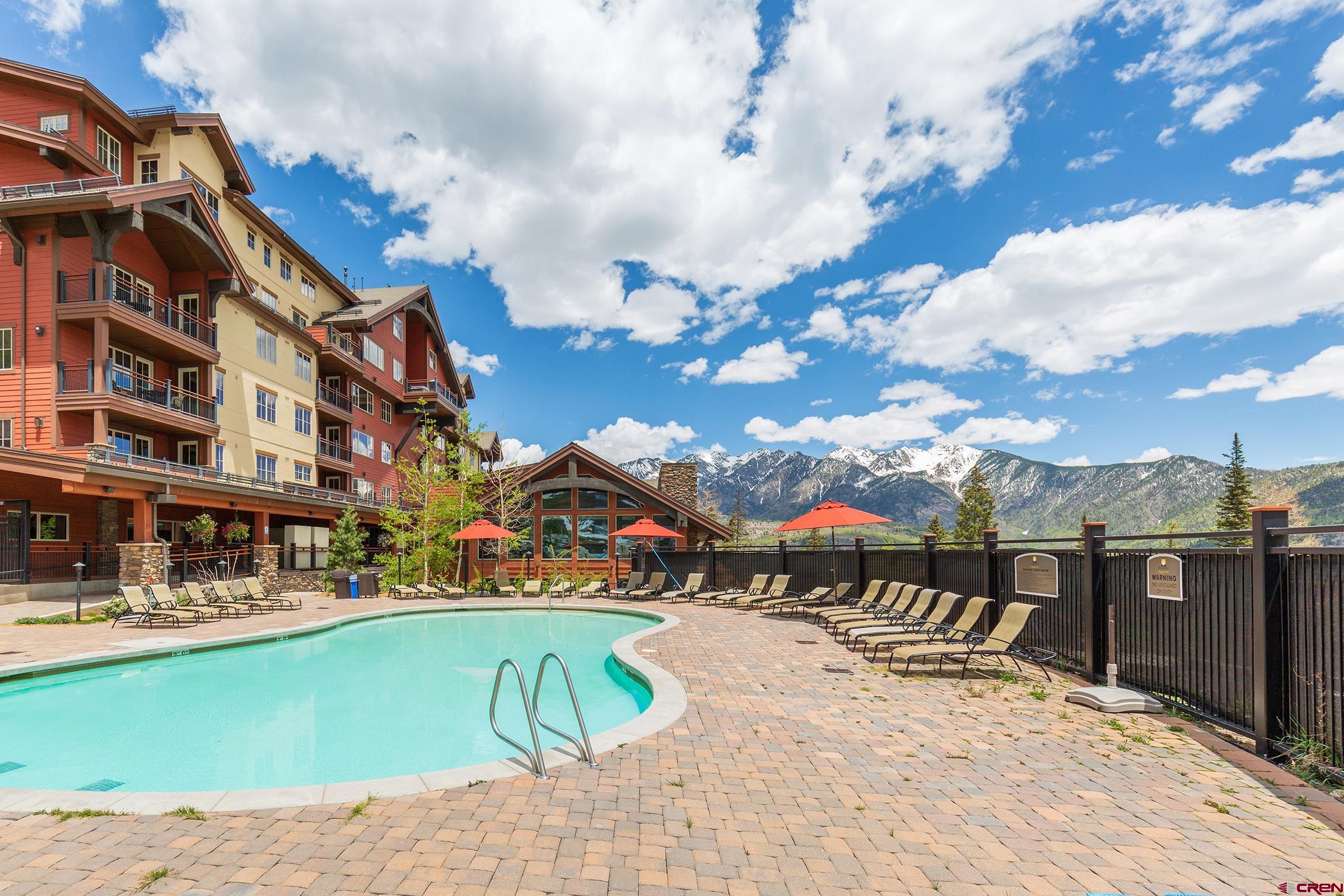 24 Sheol Street, Unit 101D Durango, CO 81301 - Photo 27 of 32 a view of a swimming pool with a lounge chairs