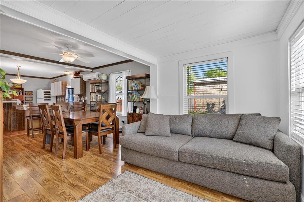 124 West Travis Dublin, TX 76446 - Photo 12 of 30 a living room with furniture and a large window