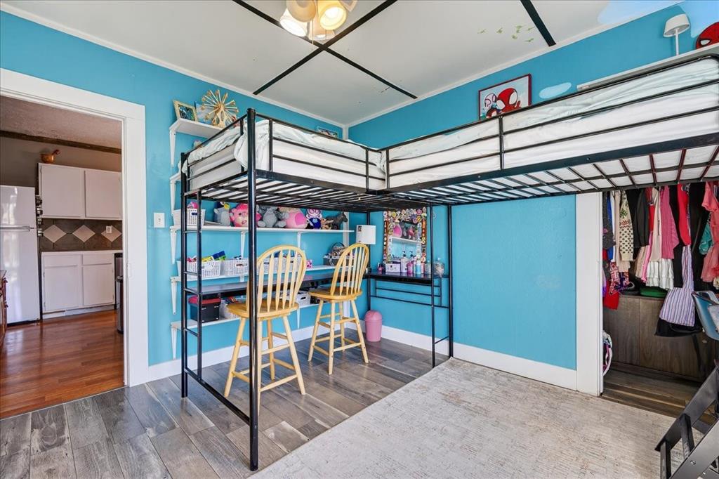 124 West Travis Dublin, TX 76446 - Photo 17 of 30 a view of a room with gym equipment