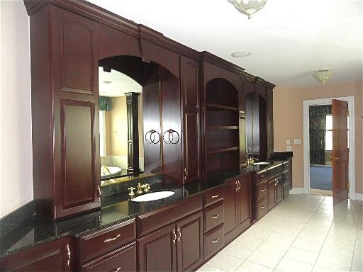 348 Firth Road Inverness, IL 60067 - Photo 11 of 16 a kitchen with granite countertop a sink and cabinets