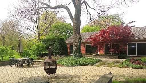 348 Firth Road Inverness, IL 60067 - Photo 15 of 16 a view of a house with backyard and a tree