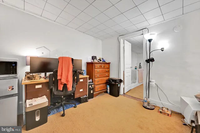 a view of a livingroom with furniture