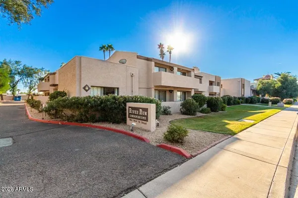 a view of a house with a swimming pool