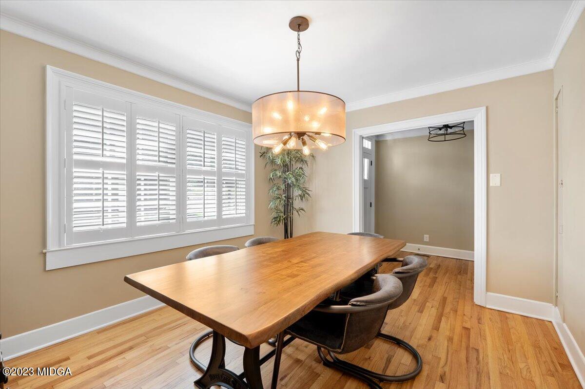 394 Overlook Road Macon, GA 31204 - Photo 18 of 29 a view of a dining room with furniture window and wooden floor