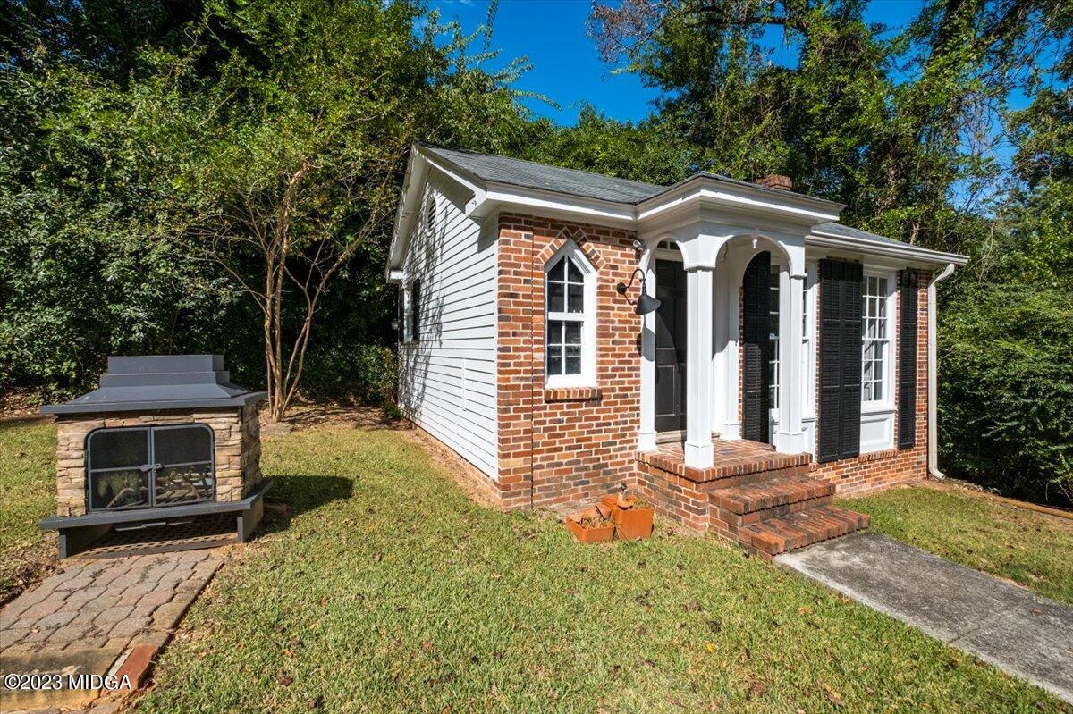 394 Overlook Road Macon, GA 31204 - Photo 19 of 29 a view of a house with a yard