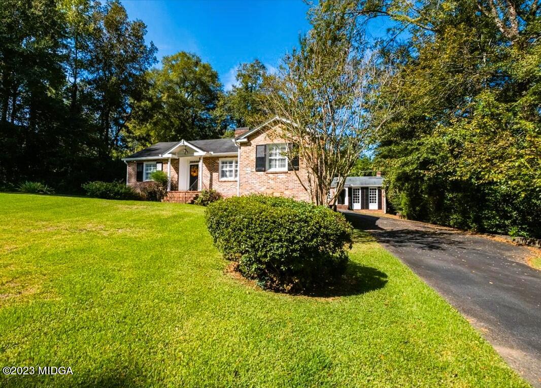 394 Overlook Road Macon, GA 31204 - Photo 28 of 29 a front view of a house with a garden