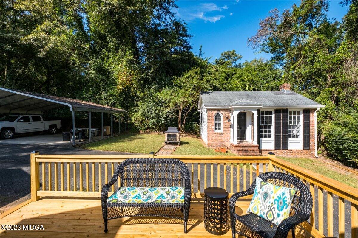 394 Overlook Road Macon, GA 31204 - Photo 4 of 29 a view of house with outdoor seating yard and deck