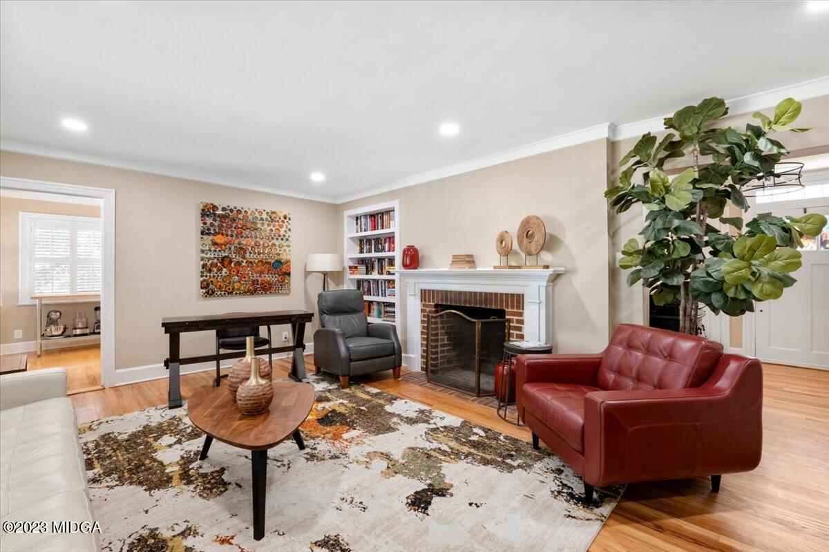 394 Overlook Road Macon, GA 31204 - Photo 5 of 29 a living room with furniture and a fireplace