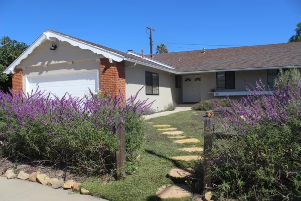 a front view of house with yard