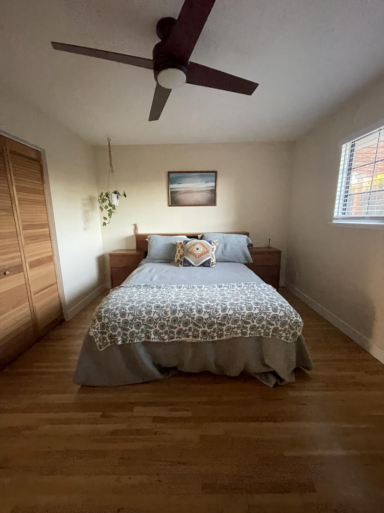 90 Brandon Drive Goleta, CA 93117 - Photo 6 of 11 a bedroom with a large bed and a window