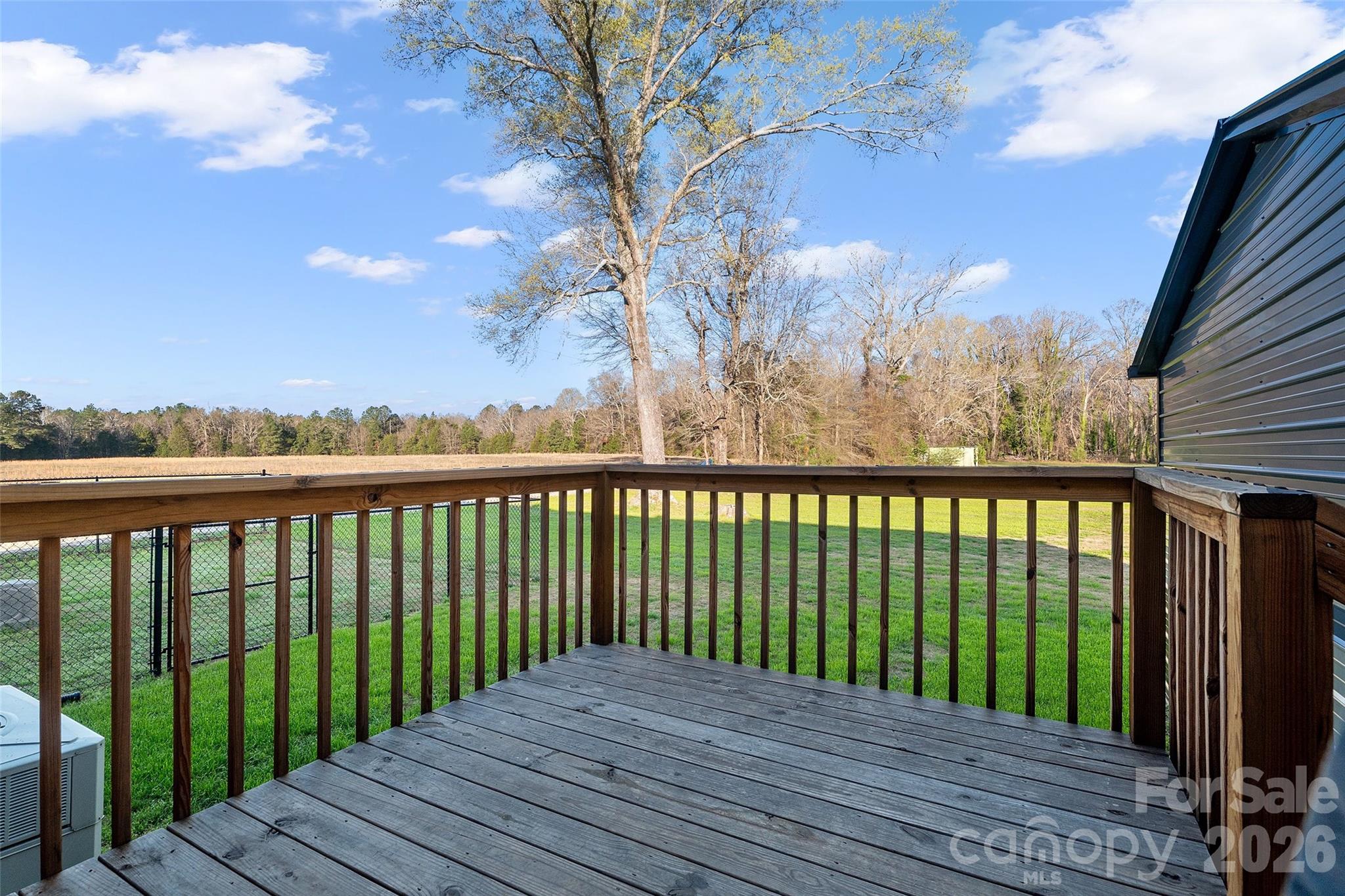 871 Saluda Road Chester, SC 29706 - Photo 30 of 46 a balcony with wooden floor and fence