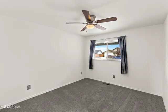 an empty room with window