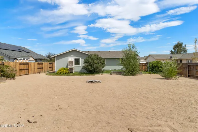 a view of house with yard and front view