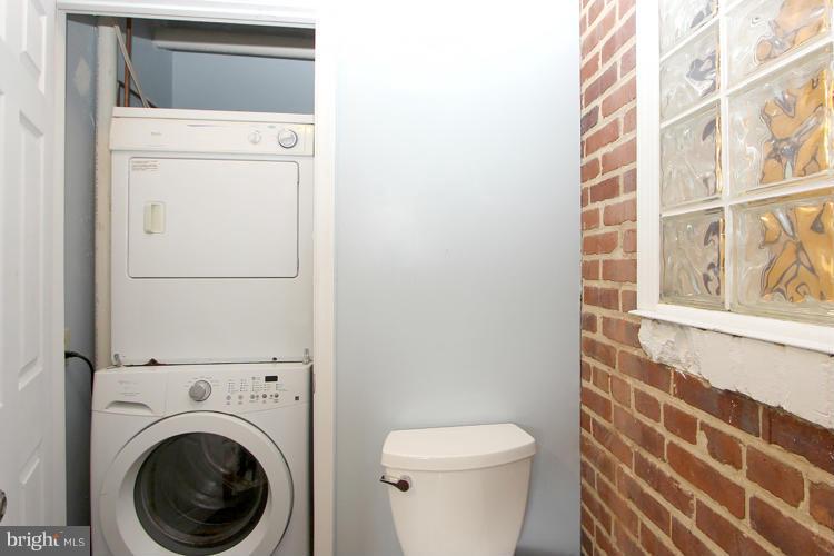 100 Ritchie Avenue Silver Spring, MD 20912 - Photo 18 of 21 a utility room with dryer and washer