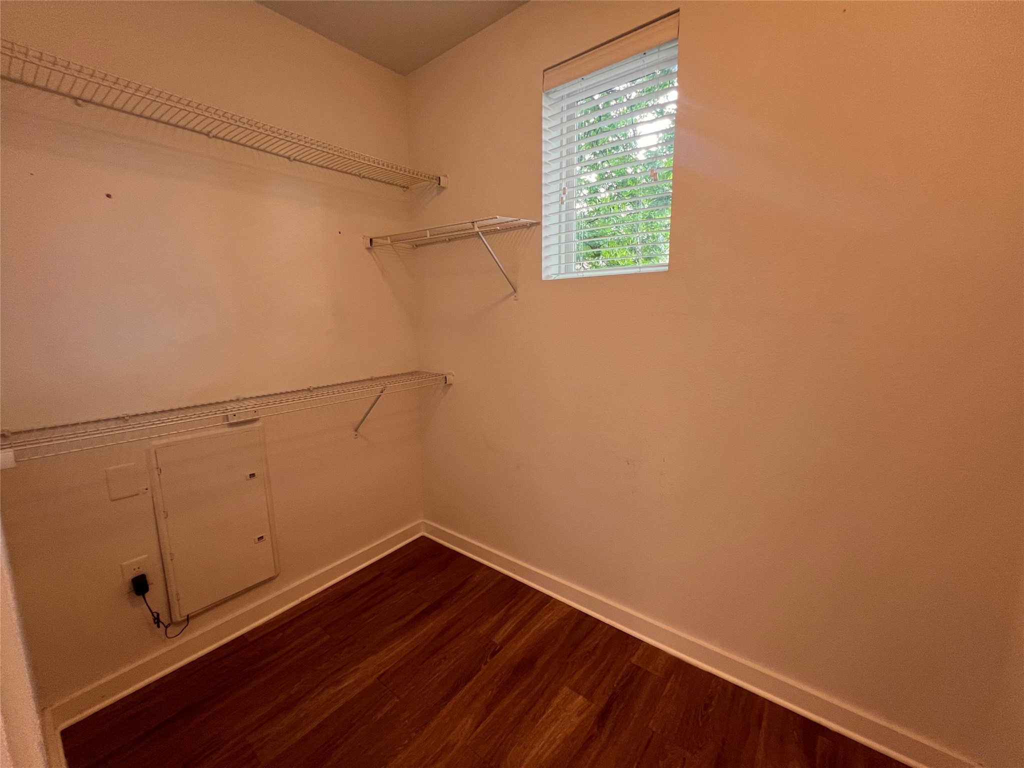 1900 Barton Springs Road, Unit 4041 Austin, TX 78704 - Photo 21 of 35 a view of a small space with racks on the wall and a window