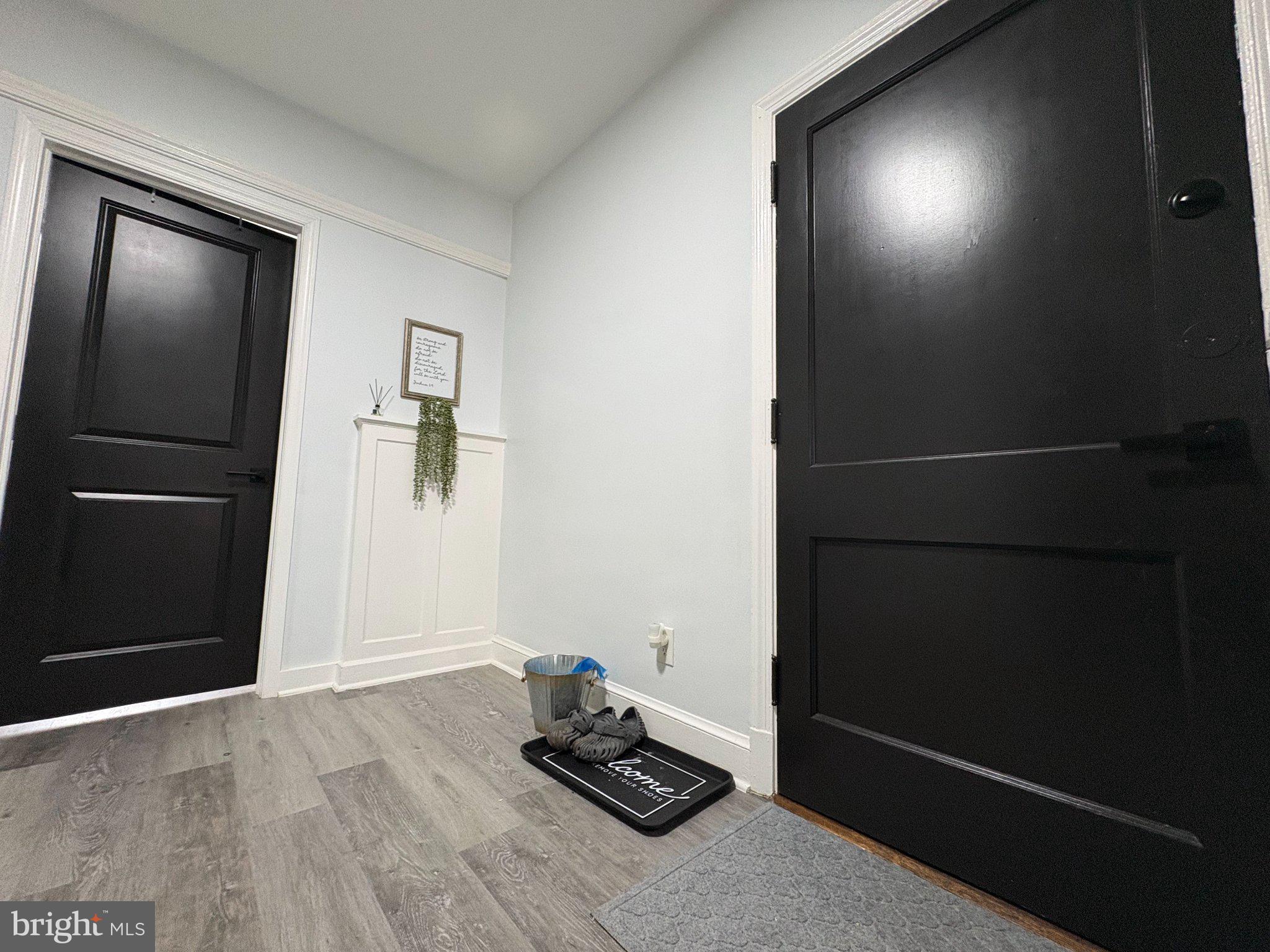 165 35th Street Northeast, Unit 3 Washington, DC 20019 - Photo 14 of 16 a room with hard wood floors and a ceiling fan