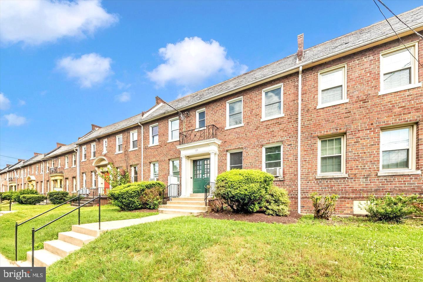 165 35th Street Northeast, Unit 3 Washington, DC 20019 - Photo 2 of 16 a view of a house with a yard