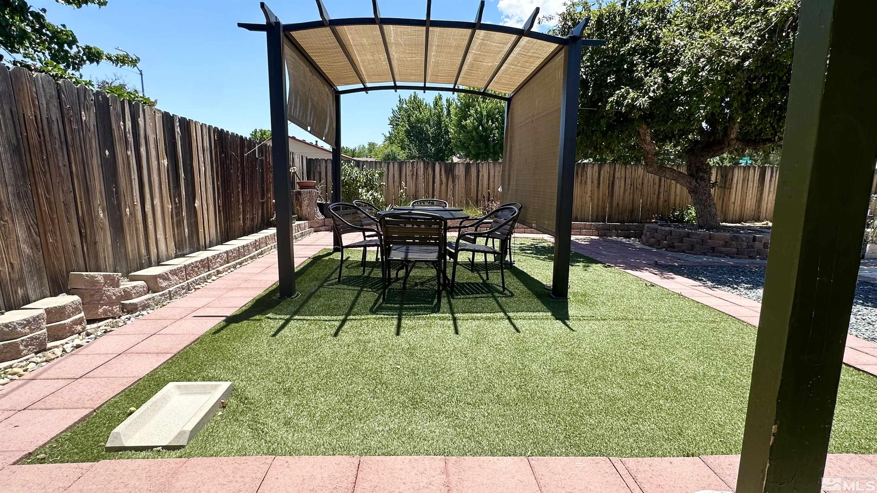 3320 Downey Avenue Reno, NV 89503 - Photo 15 of 20 a view of chair and tables in the backyard