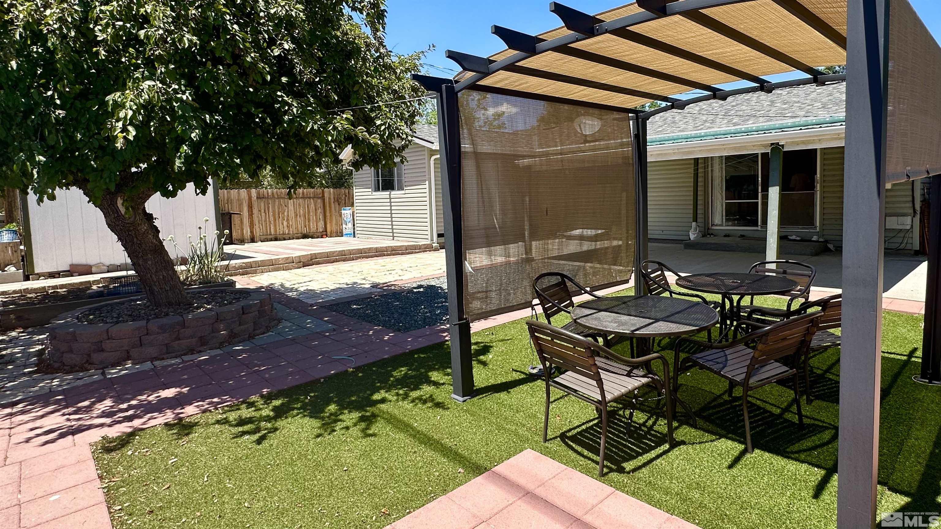 3320 Downey Avenue Reno, NV 89503 - Photo 17 of 20 a backyard of a house with table and chairs