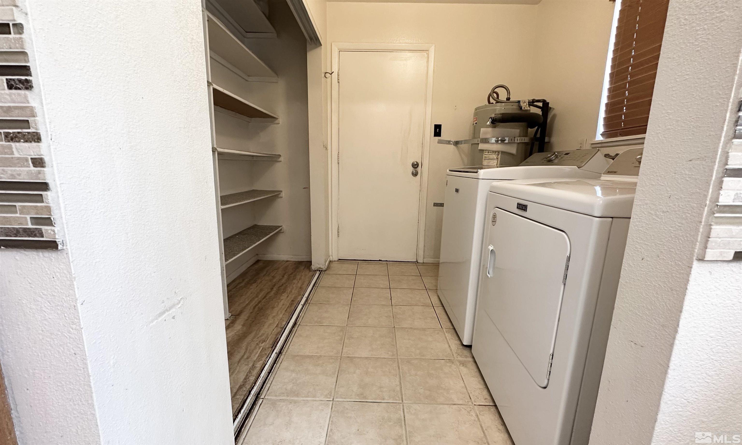 3320 Downey Avenue Reno, NV 89503 - Photo 7 of 20 a view of storage and utility room with washer and dryer