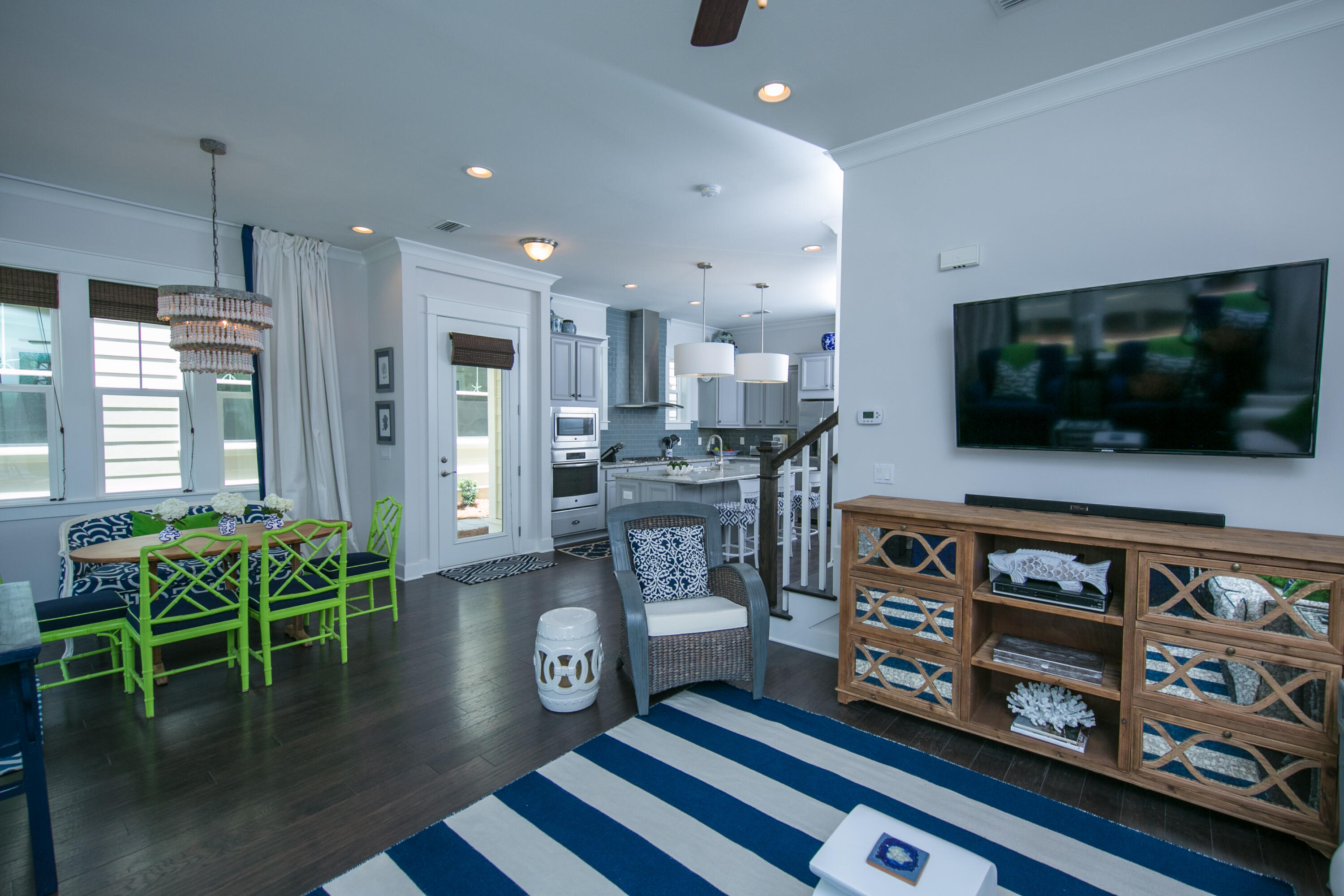 85 York Ln Inlet Beach, Unit B Inlet Beach, FL 32461 - Photo 2 of 31 a living room with furniture and a flat screen tv