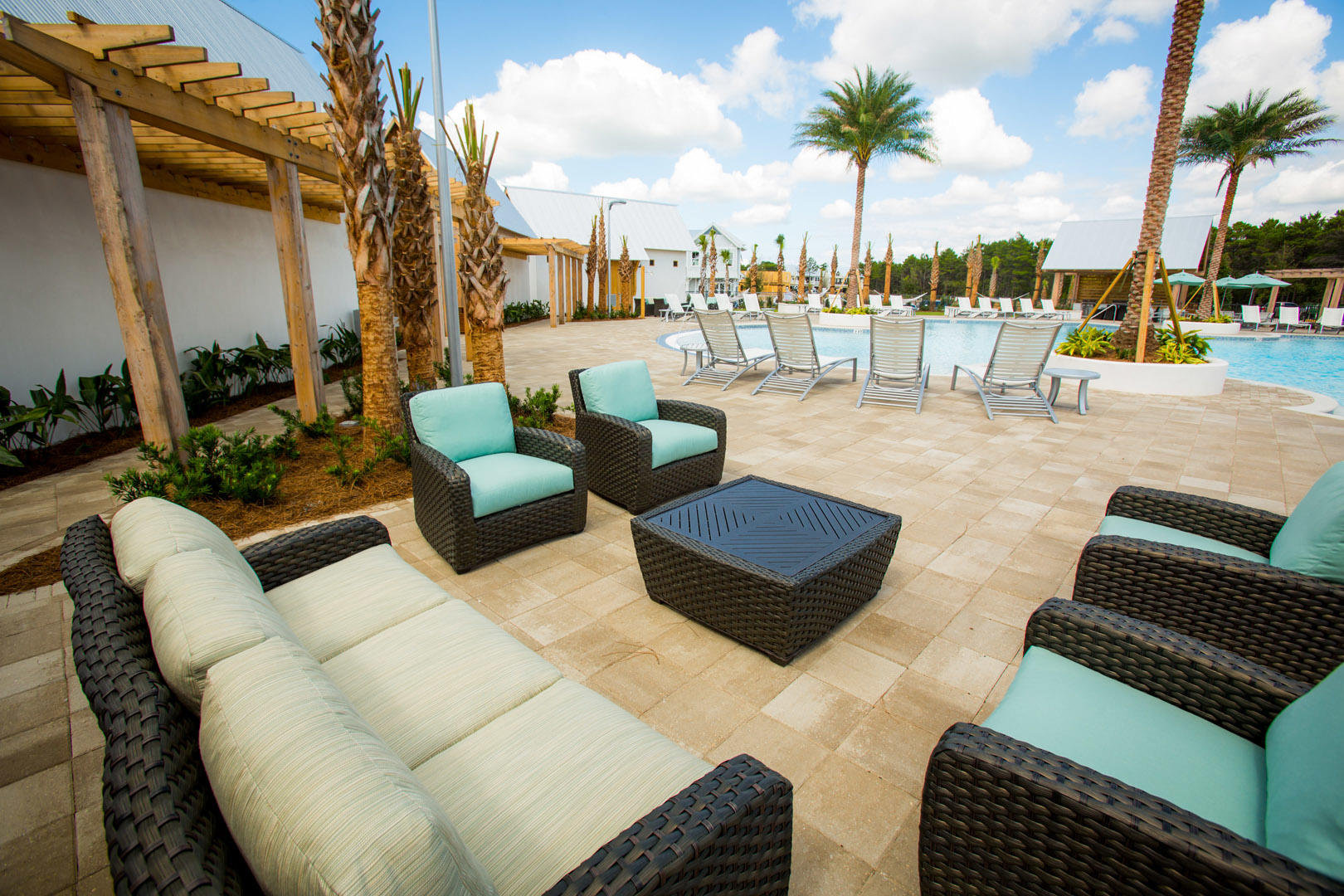 85 York Ln Inlet Beach, Unit B Inlet Beach, FL 32461 - Photo 21 of 31 a view of a patio with couches and a fire pit