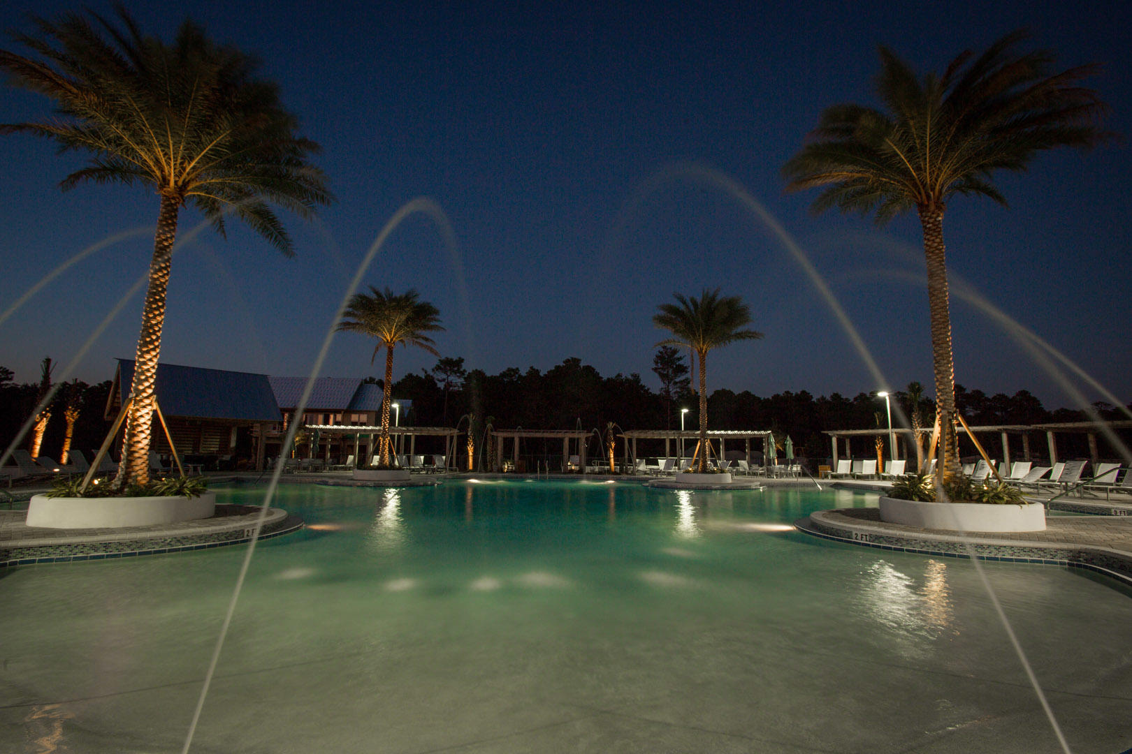 85 York Ln Inlet Beach, Unit B Inlet Beach, FL 32461 - Photo 25 of 31 a view of a swimming pool with seating area