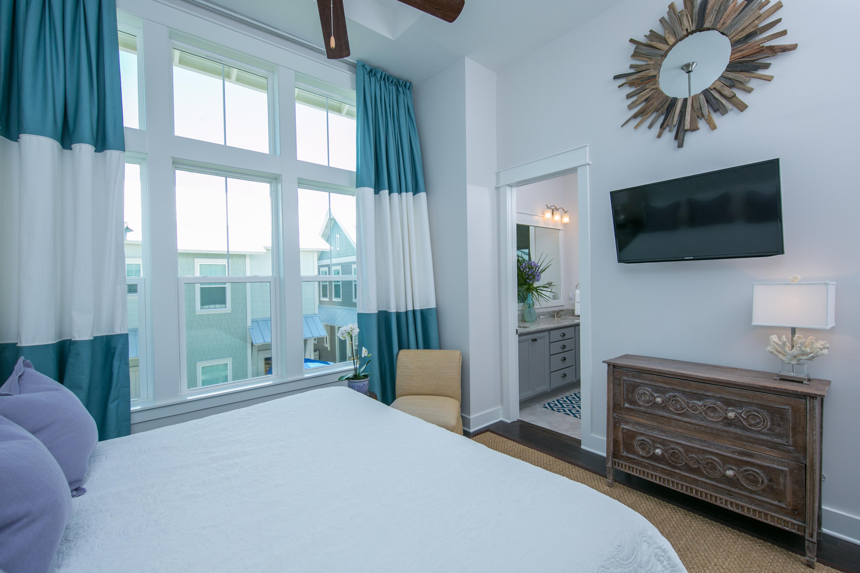 85 York Ln Inlet Beach, Unit B Inlet Beach, FL 32461 - Photo 5 of 31 a bedroom with a bed and a television