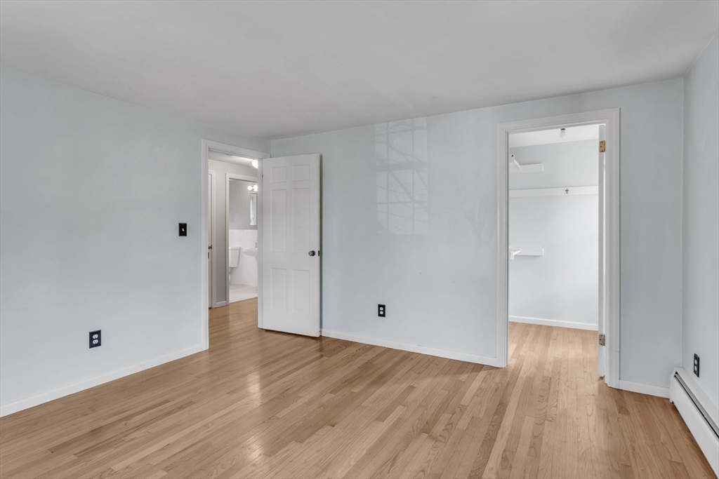 10 Russell Road Wilbraham, MA 01095 - Photo 31 of 42 a view of an empty room with wooden floor