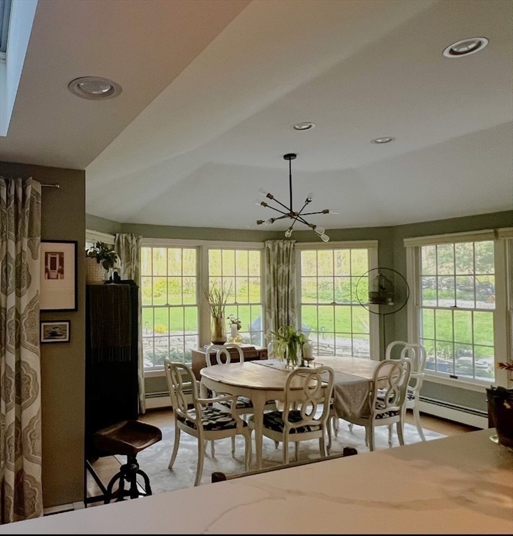 10 Russell Road Wilbraham, MA 01095 - Photo 8 of 42 a view of a dining room with furniture window and outside view