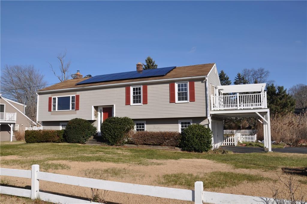 Welcome to 154 Soundview! Note the solar on the roof for super low electric bills..... panels are owned not leased.