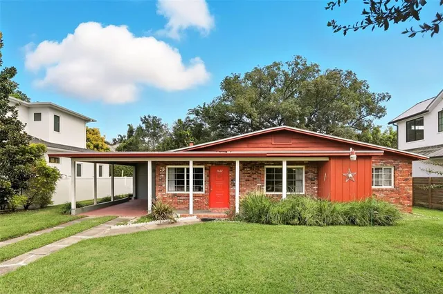front view of a house with a yard