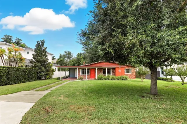 a house with swimming pool in front of it