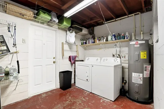 a utility room with dryer and washer